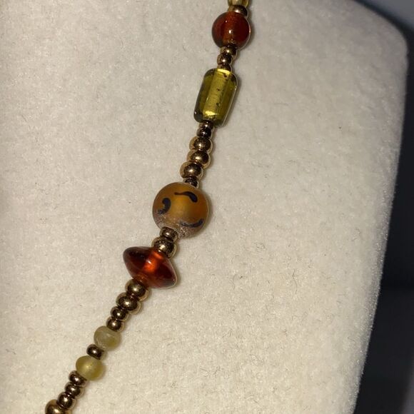 Vintage Boho Beaded Necklace with Drop Dangle Caged Bead Brown and Gold Accents - Picture 8 of 11